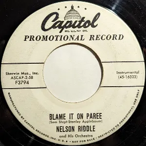 Pochette de Blame It on Paree / In a Small Forgotten Town de Nelson Riddle and His Orchestra