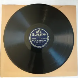 Pochette de When the Sun Comes Out / I'll Never Let a Day Pass By de Charlie Barnet and His Orchestra
